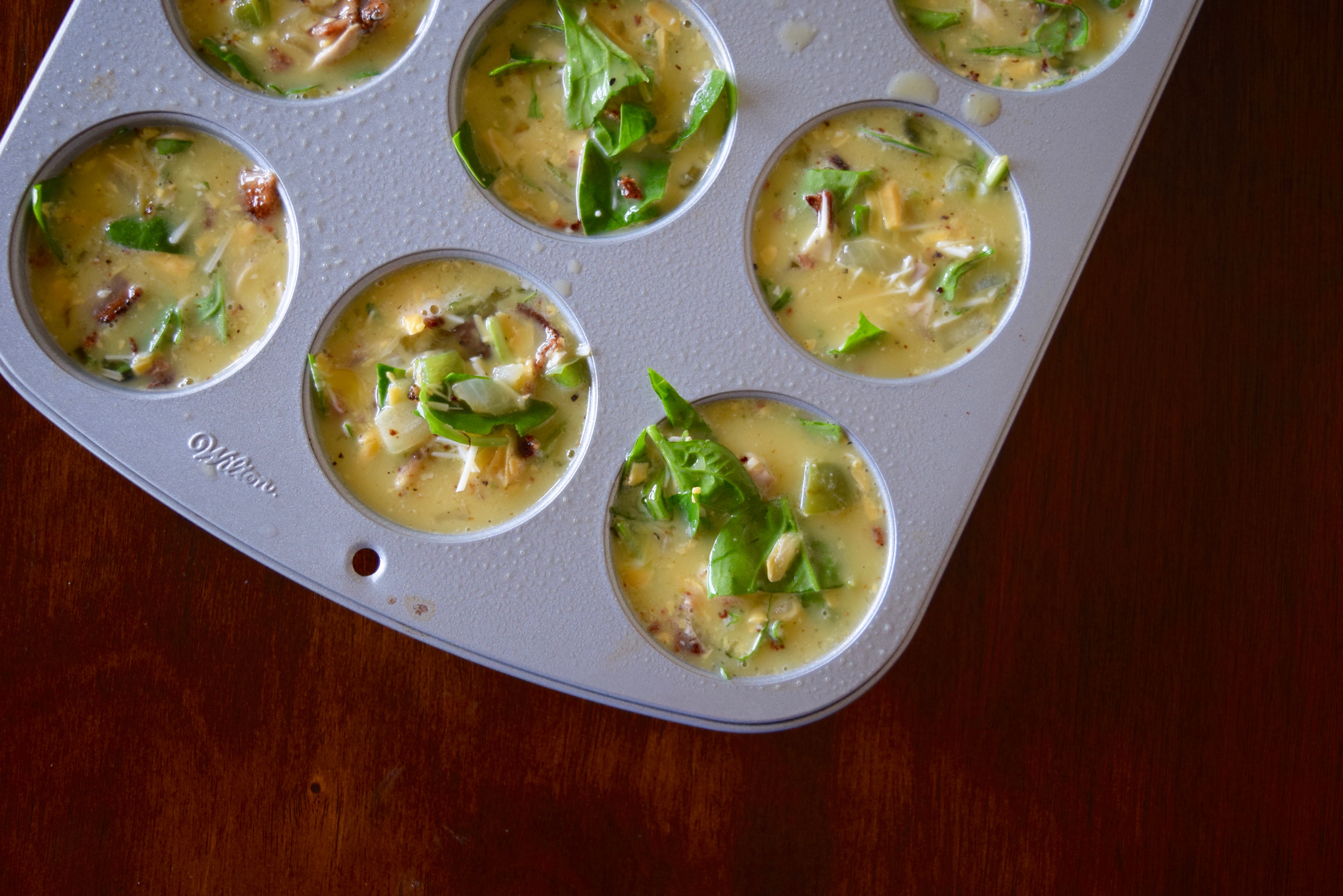 Easy Mini Omelettes // Loaded with veggies, cheese and bacon. // Low carb, high protein