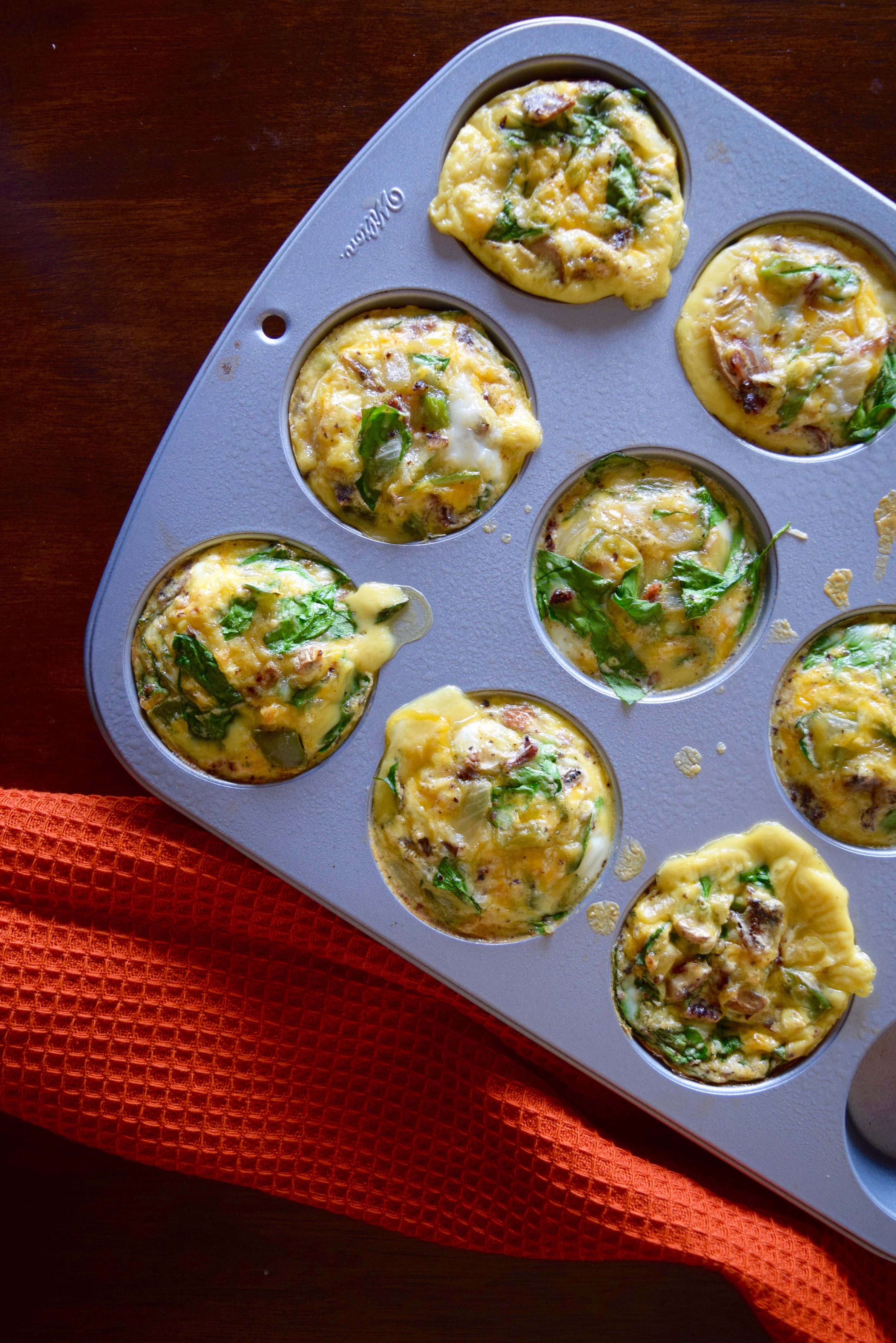 Easy Mini Omelettes // Loaded with veggies, cheese and bacon. // Low carb, high protein