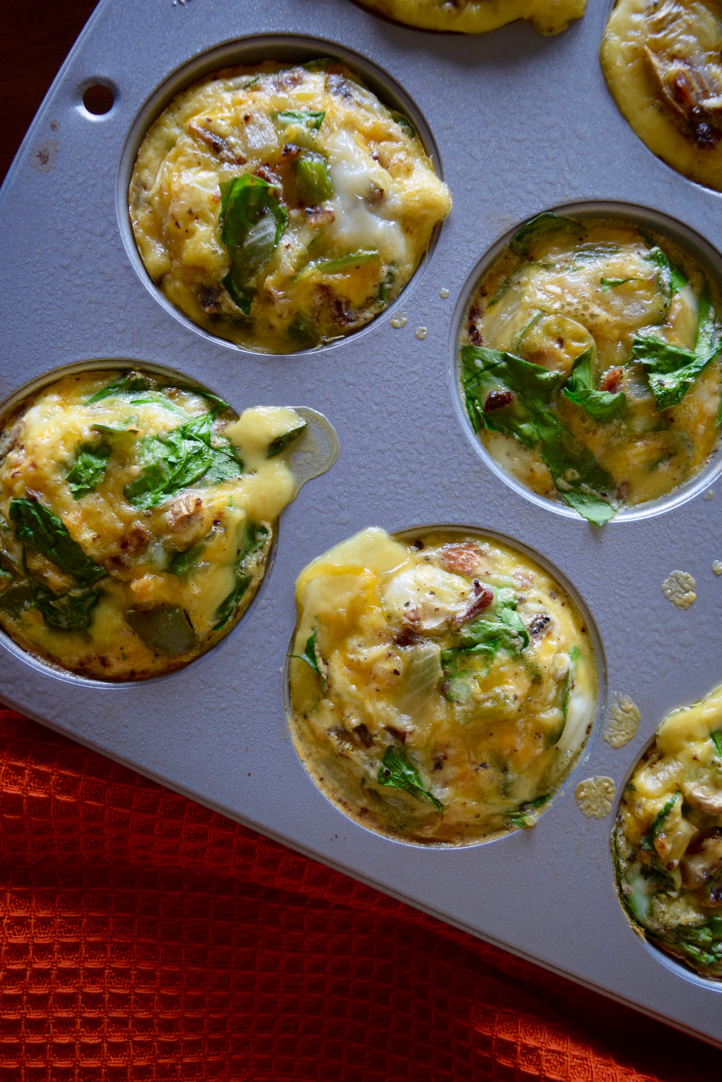 Easy Mini Omelettes // Loaded with veggies, cheese and bacon. // Low carb, high protein