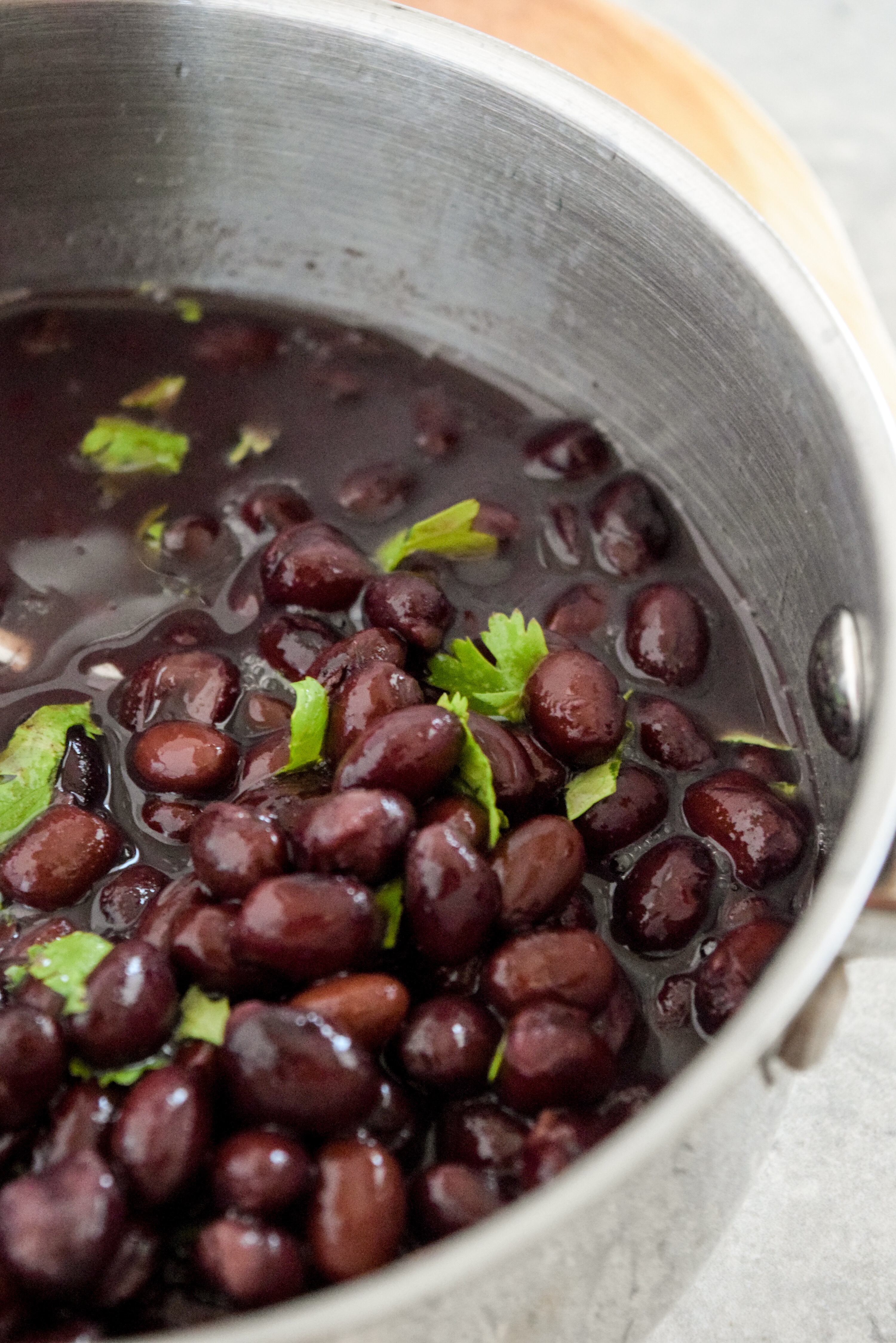 Sometimes you just need an easy way to doctor up canned black beans for taco night- this is your recipe! Cilantro Lime Black Beans are so easy to throw together in a pinch. 