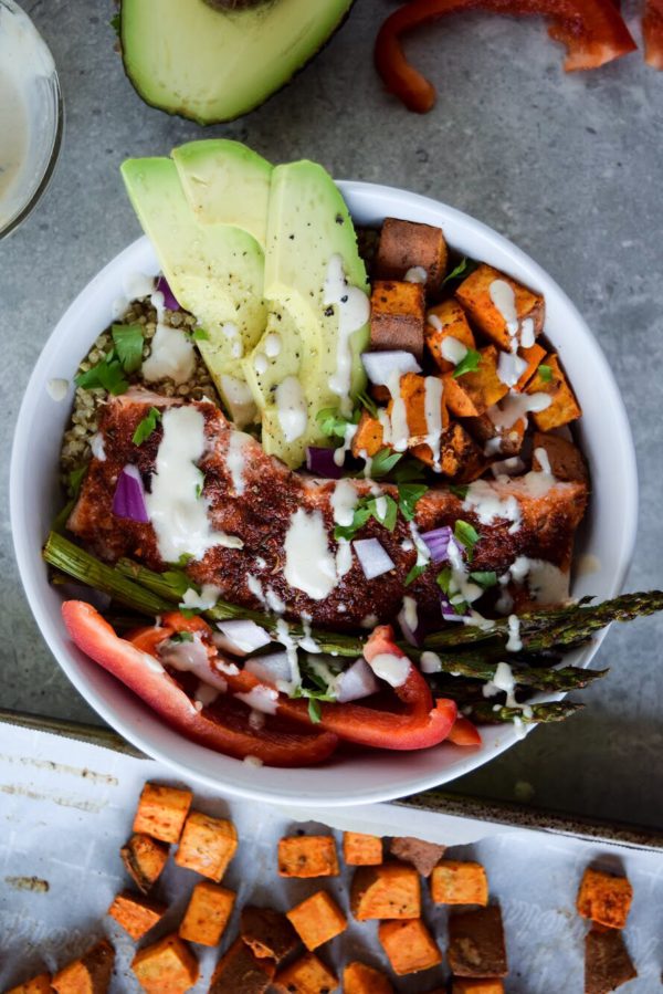 These Salmon and Quinoa Power Bowls with Lemon Tahini Dressing are packed with flavor and so easy to double or triple up for meal prep!