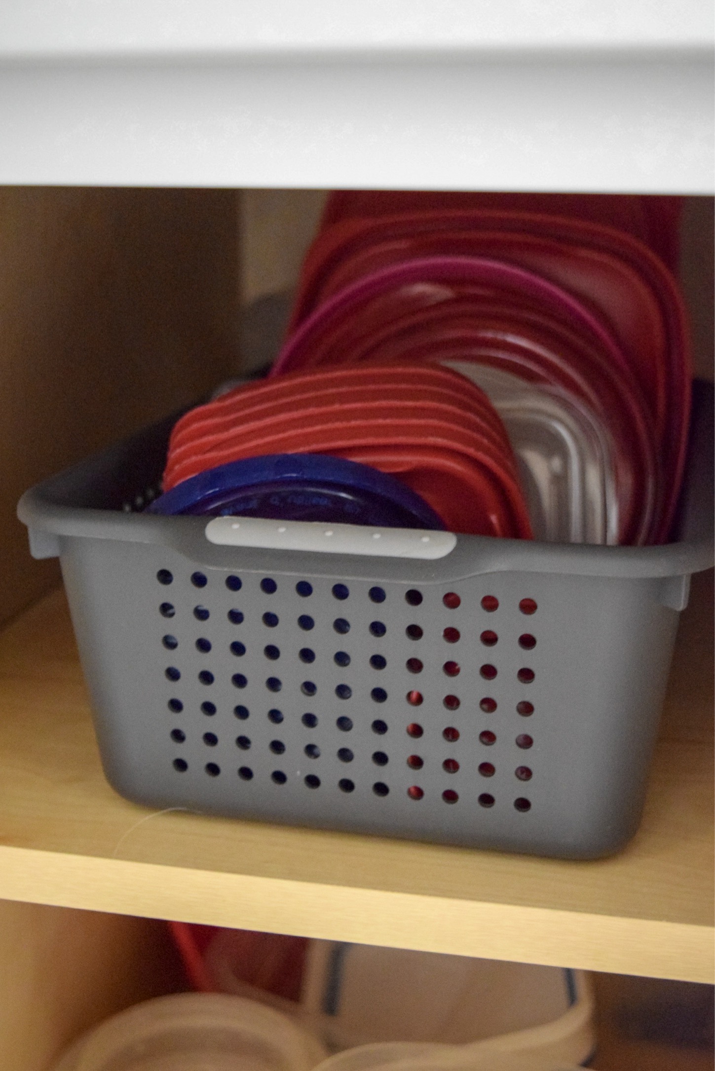 Easy Way to Organize Tupperware in Cabinets