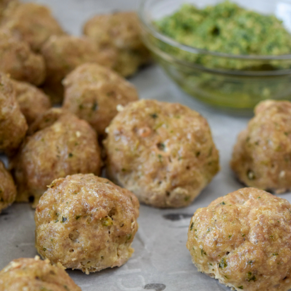 Whole30 & Paleo Pesto Turkey Meatballs! These meatballs are crazy easy to make and can be used in so many ways. Make a double batch and freeze half for a quick lunch or dinner later!