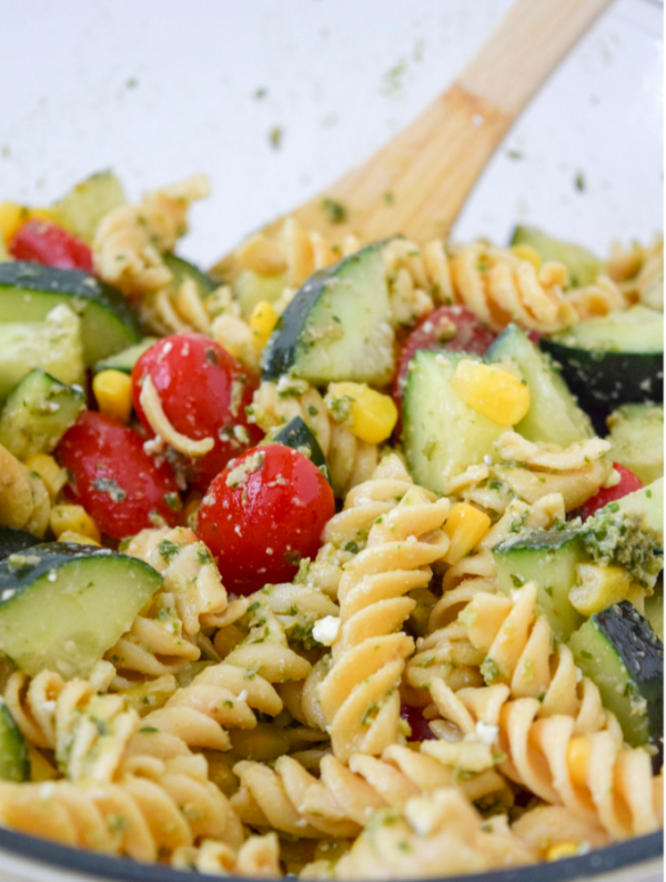 This Corn, Feta & Pesto Pasta Salad is the perfect summer twist on a pasta salad! Perfect for an easy side for a BBQ or add some protein to it for a complete meal!