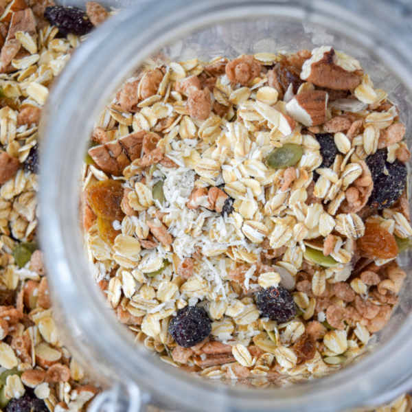 This Easy Toasted Pecan Muesli is perfect for a satisfying breakfast that will keep you full for hours! Make it your own by using your favorite dried fruits, nuts and seeds! #muesli #mealprepbreakfast #easybreakfast