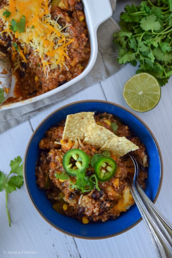 This Cheesy Lentil & Quinoa Enchilada Bake is a dump it and leave it kind of meal! Enjoy it as is, scoop it up with chips, or layer over a sheet of tortilla chips for some killer vegetarian nachos.