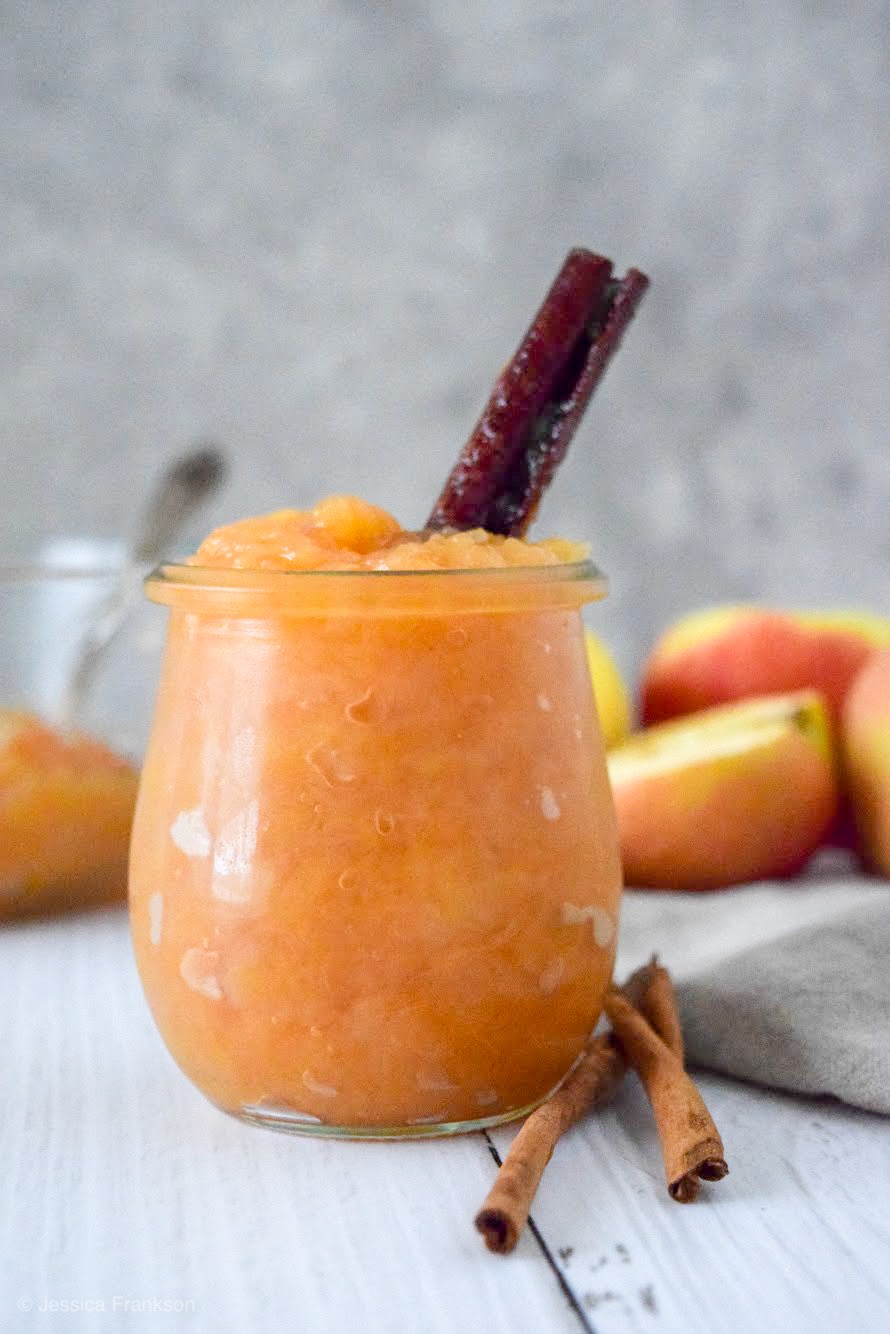 Once you try this Homemade Sugar-Free Cinnamon Applesauce, you'll never go back to store-bough! It's seriously so good and so easy to make in the slow cooker or Instant Pot! #applesaucerecipe #fallrecipe #sugarfree #paleo