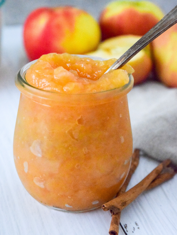 Once you try this Homemade Sugar-Free Cinnamon Applesauce, you'll never go back to store-bough! It's seriously so good and so easy to make in the slow cooker or Instant Pot! #applesaucerecipe #fallrecipe #sugarfree #paleo